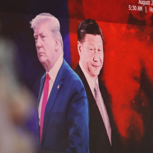 A computer screen in Seoul shows images of Chinese President Xi Jinping and President Donald Trump in 2019. Ahn Young-joon/AP