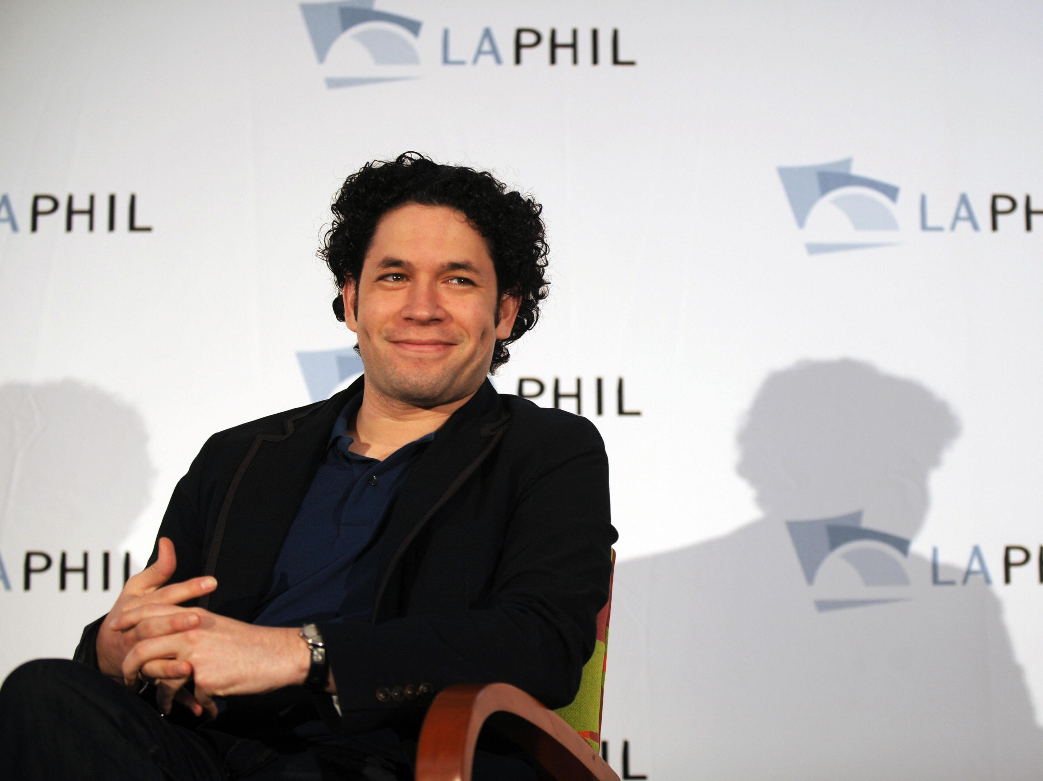 The Venezuelan conductor Gustavo Dudamel (R), his wife, the