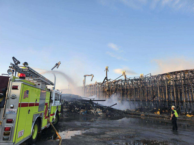 Hotspots at the Lineage Logistics fire in Finley, Washington, flared up Tuesday because of high winds. The fire has been burning for seven weeks. (Credit: Benton County Fire District 1)