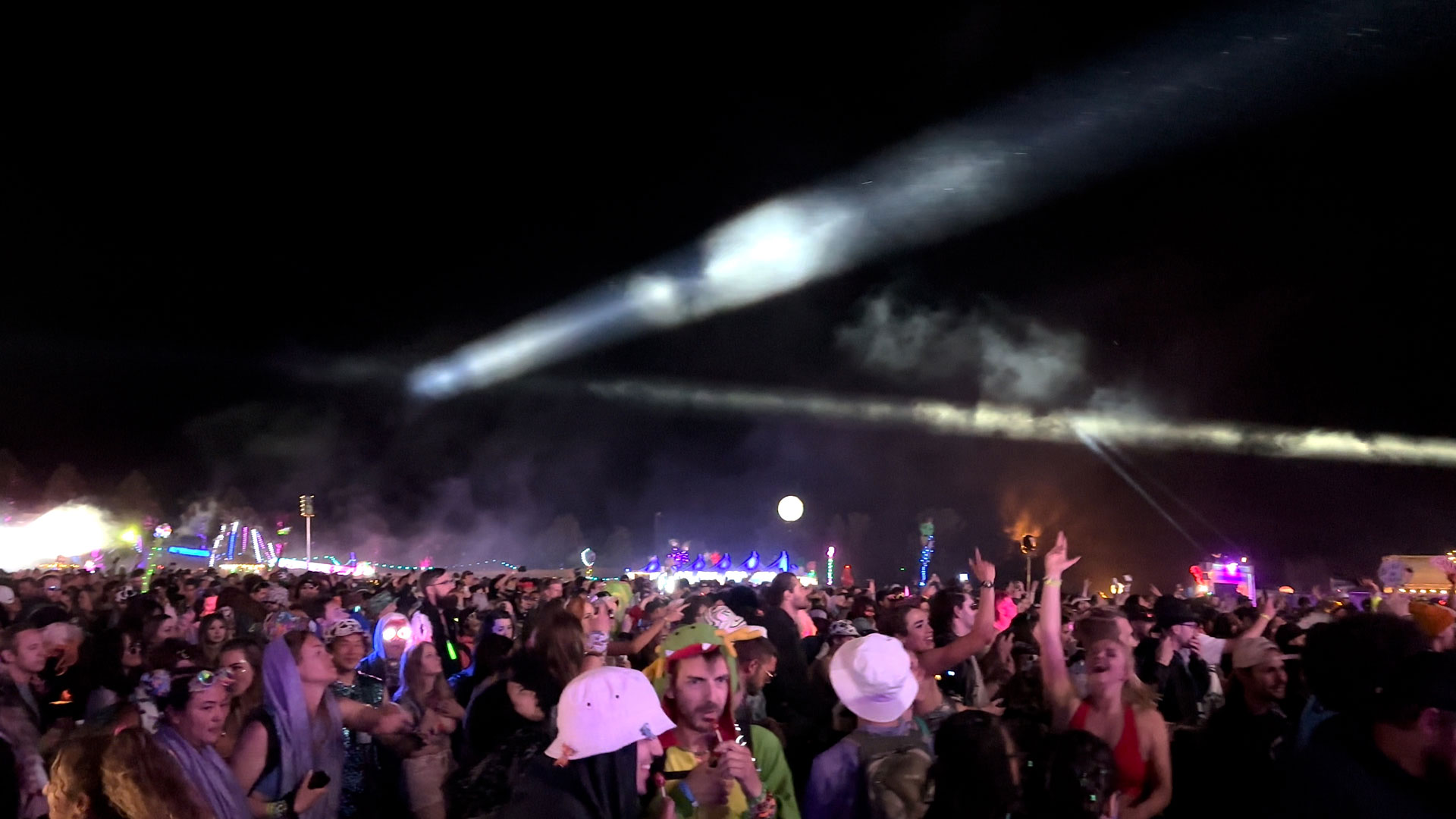 The remaining crowd dances to drum and bass artist Sub Focus at the Gorge Amphitheatre in George, Washington, after the shooting at the Beyond Wonderland festival on June 17, 2023.