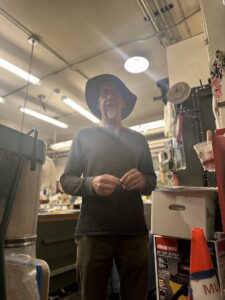 Miller at the door to his workshop, which he shares with other museum staff. (Photo credit: Lauren Gallup / NWPB)