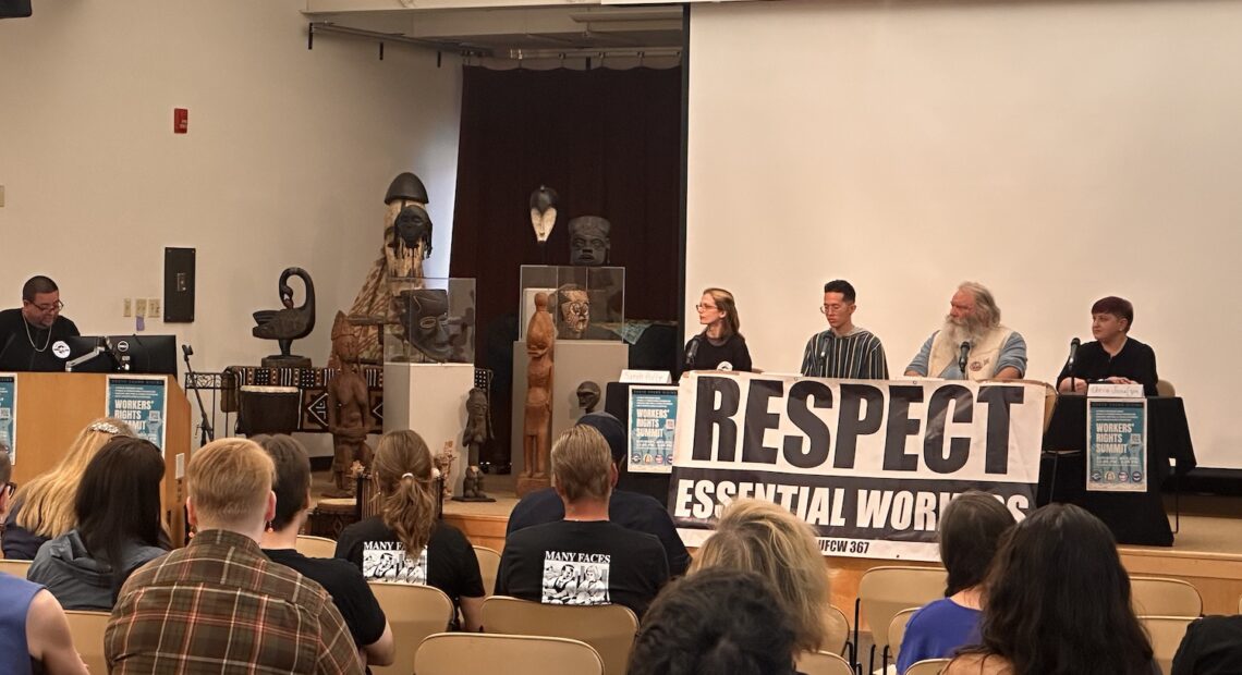 Workers spoke at a summit for workers' rights in Tacoma in July. This included grocery store workers, who spoke about concerns with inadequate staffing.