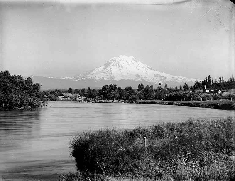 View of Mount Rainier looking southeast up Puyallup River, Tacoma, July 10, 1899. The dam was built on the river in 1904. (Courtesy: Wikimedia Commons)