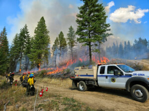 Crews perform a prescribed fire in the Rainwater Wildlife Area near Dayton, Washington. (Credit: Johanna Bejarano / NWPB)