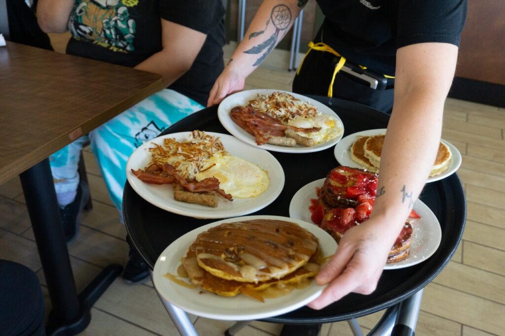 Breakfast food on a tray. 