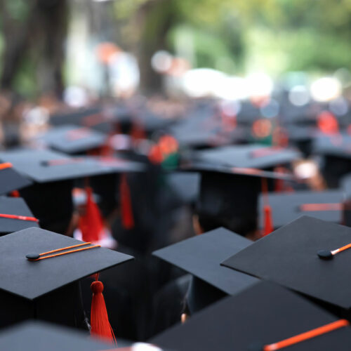 A group of graduates during a commencement ceremony.