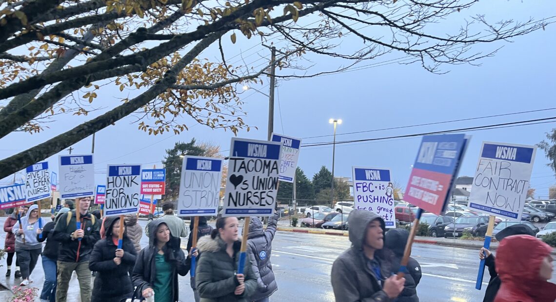 Nurses picket outside St. Joseph Medical Center on Nov. 1 as they push for a contract that addresses their safety and staffing concerns. (Credit: Lauren Gallup / NWPB)