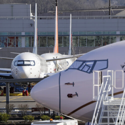 Grounded Boeing 737 MAX airplanes fill a parking area adjacent to Boeing Field Wednesday, Feb. 19, 2020, in Seattle. (AP Photo/Elaine Thompson)