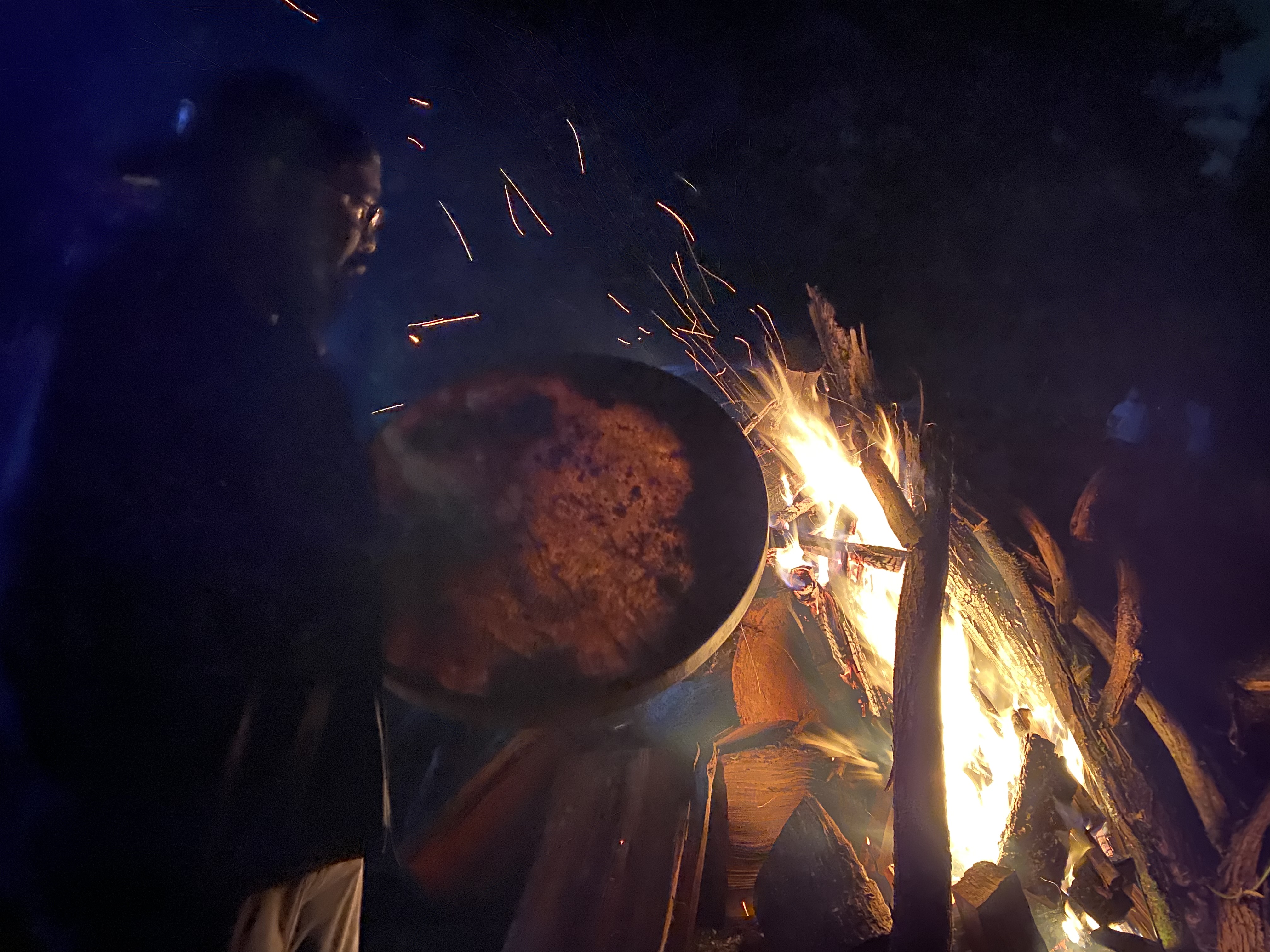 Yatsu-Ats “Joe” McCloud sings and drums by the bonfire at the Nisqually Culture Center during the Winter Moon Celebration on Winter Solstice. 