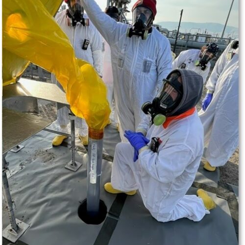 Hanford workers take samples from tank SY-101 in southeast Washington state.