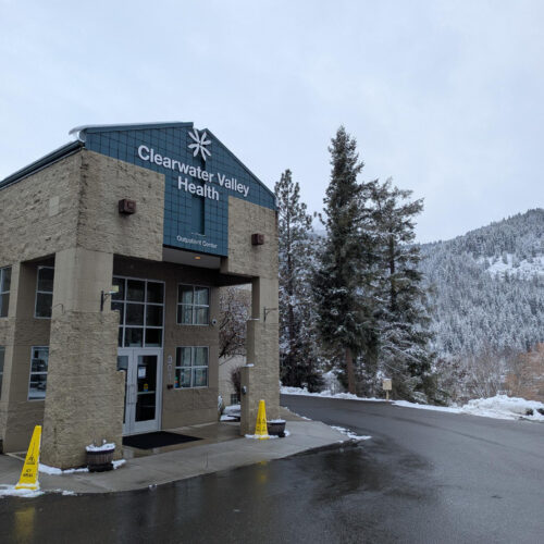 An exterior shot of Clearwater Valley Health. The sky is gray and there is snow on the ground.