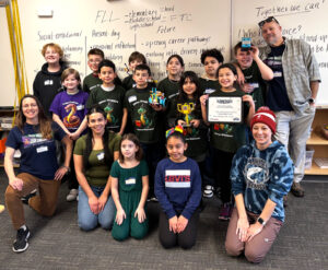 Marcus Whitman Elementary School’s FIRST Lego League Challenge and Explorers teams. The fourth and fifth graders on the Dino Nuggys team are raising money to compete at an international competition in Massachusetts this summer. (Credit: Courtney Flatt / NWPB)